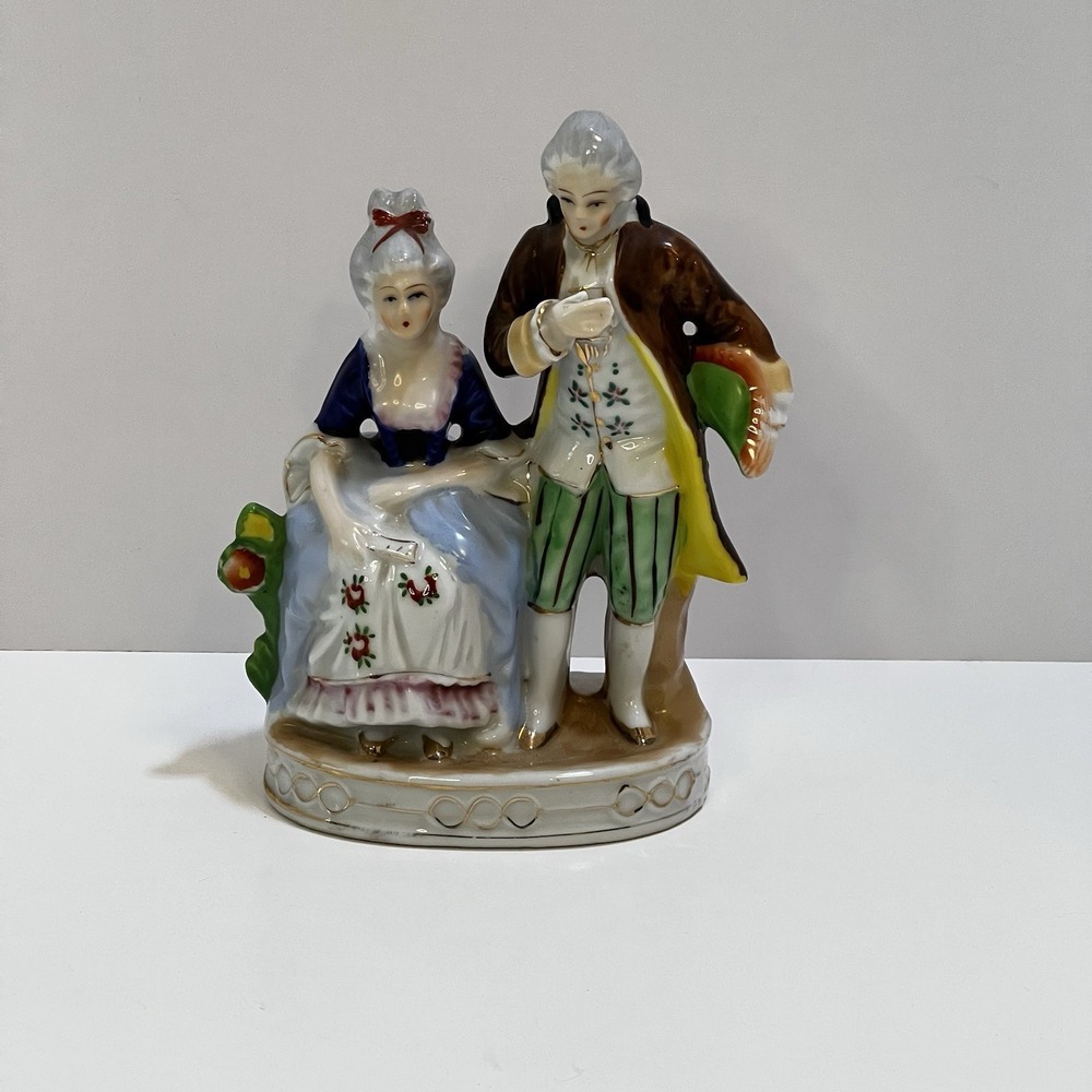 Vintage porcelain‎ figurine colonial man and women made in occupied Japan